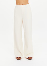 THE UPSIDE women's cream pinstripe Orion Mira Wide Leg Pant is a true-to-size fit and features a flat waistband with belt loops and side pockets. The perfect wardrobe essential.