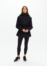 THE UPSIDE women's black Freddie Fleece Lined Anorak is made from bonded water resistant fabric with internal warm polar fleece and features external pockets with flap closure and drawcord with toggles to cinch in waist.