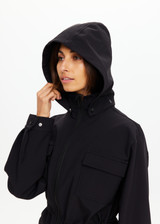 THE UPSIDE women's black Freddie Fleece Lined Anorak is made from bonded water resistant fabric with internal warm polar fleece and features external pockets with flap closure and drawcord with toggles to cinch in waist.