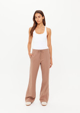 THE UPSIDE women's mocha Jetset Pant is designed for a regular fit and features an elasticated waist with a drawcord and front and back packets. The perfect everyday pant.