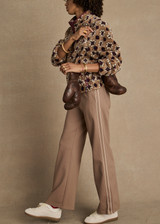THE UPSIDE women's mocha Jetset Pant is designed for a regular fit and features an elasticated waist with a drawcord and front and back packets. The perfect everyday pant.