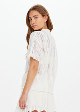 THE UPSIDE women's cream Agni Amayah Knit Shirt is designed for a relaxed fit and features a chevron knit design with pearlised shell buttons. The perfect vacation piece.