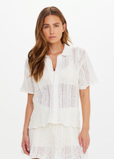THE UPSIDE women's cream Agni Amayah Knit Shirt is designed for a relaxed fit and features a chevron knit design with pearlised shell buttons. The perfect vacation piece.