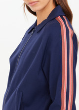 THE UPSIDE women's navy Ananda Pari Zip Jacket is a true-to-size fit and features a zip-through front, front pockets and knitted stripes down sleeves. The perfect everyday piece.