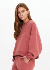THE UPSIDE women's red organic cotton Serendipity Paloma Crew is designed for a boxy fit and features drop shoulders and The Upside logo puff printed at the front. Made for everyday.