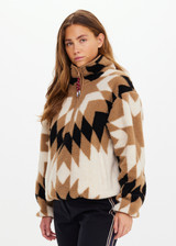 THE UPSIDE women's Harlow Fleece Pullover is a relaxed pullover style in our geometric star design and features a quarter zip opening, zip pockets and elasticated waist and cuffs to keep warmth in. Designed for Après-ski and winter wear.