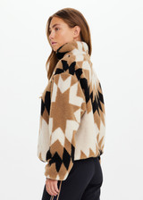 THE UPSIDE women's Harlow Fleece Pullover is a relaxed pullover style in our geometric star design and features a quarter zip opening, zip pockets and elasticated waist and cuffs to keep warmth in. Designed for Après-ski and winter wear.