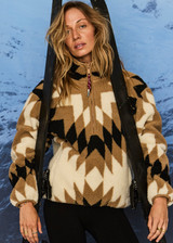 THE UPSIDE women's Harlow Fleece Pullover is a relaxed pullover style in our geometric star design and features a quarter zip opening, zip pockets and elasticated waist and cuffs to keep warmth in. Designed for Après-ski and winter wear.