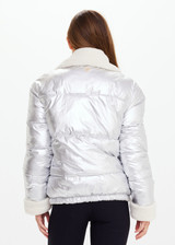 THE UPSIDE women's silver metallic Lotti Reversible Puffer Jacket features a zip opening and pockets lined with polar fleece. Designed for Aprs-ski and winter wear.