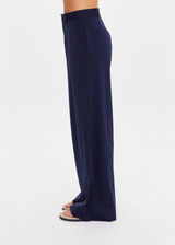 THE UPSIDE women’s navy Mira Wide Leg Pant is high-waisted made from quick-dry fabric, with a structured waistband and fly zip closure. Perfect for everyday.