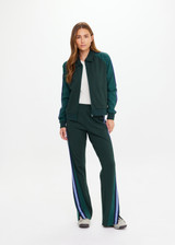THE UPSIDE women’s green Maneki Pari Zip Jacket in Lenzing viscose features a zip-through design with striped knit tape down the sleeves. Made for everyday leisure.