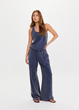 THE UPSIDE women's blue recycled cotton Soho Kapri Racerback Tank has a relaxed fit with fabric-covered buttons at the scoop neck. Made for lifestyle.