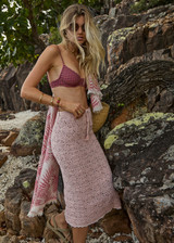 THE UPSIDE women's pink organic cotton Anoki Irena Crochet Midi Skirt features an elasticated waist with tassel braided drawcord and cream scalloped edge detailing. Perfect for travel or everyday.