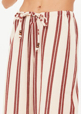 THE UPSIDE women's stripe organic cotton Baja Charli Drawstring Pant is low-rise with a straight leg, soft elastic waistband, and wooden bead ends on drawcord. Made for lifestyle.