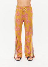 THE UPSIDE women's floral Fantasy Roma Pant is a true-to-size fit and features an elasticated waistband with a drawcord, side pockets and cream side stripes. The perfect summer wardrobe piece.