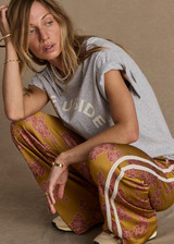 THE UPSIDE women's grey organic cotton Sammi Tee is designed for an oversized fit and features a printed horseshoe logo in cream at the front. The perfect everyday piece.