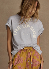 THE UPSIDE women's grey organic cotton Sammi Tee is designed for an oversized fit and features a printed horseshoe logo in cream at the front. The perfect everyday piece.