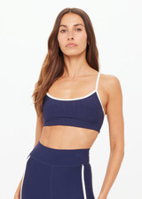 THE UPSIDE women’s navy recycled peached Samara Bowie Bra offers a soft & supportive fit and features a scooped front neckline with crossback and removable cups. Made for yoga & pilates.