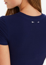 THE UPSIDE women’s navy Shelter Fitted Tee features an embroidered arrow logo at the back of neck. The perfect everyday tee.