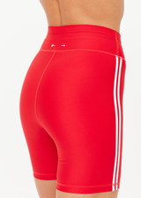 THE UPSIDE women's red eco tech Oxford 5-inch Spin Short is supportive and comfortable with mid-rise, cream side stripes, and elastic waist drawcord. Made for high impact.
