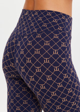 THE UPSIDE women's monogram jacquard Ezra Florence Flare is high-rise with a firm & supportive fit, featuring a V panel waistband and side seam split at hem. Made for yoga and pilates.