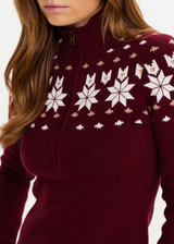 THE UPSIDE women’s maroon organic cotton Le Ski Blanche Half Zip features a zip through opening and a knitted snowflake design across chest and back. Designed for Après-ski and winter wear.