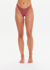 THE UPSIDE women's pink check Aliki Christy Pant has low coverage and is fully lined. Made for swim.