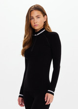 THE UPSIDE women’s black merino Wool Seamless Base Quarter Zip offers a soft & comfortable fit and features white striped ribbing on cuffs and collar. Designed for Après-ski and winter wear.