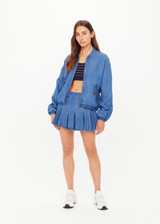 THE UPSIDE women’s blue denim Lykke Lexi Bomber Jacket, in a soft chambray fabrication, is made for a relaxed fit. This zip-through jacket features front pockets with branded tortoiseshell buttons.