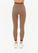 THE UPSIDE women’s recycled mocha Form Seamless 25In Legging offers a supportive fit with a soft ribbed waistband and moisture control. Made for yoga and pilates.