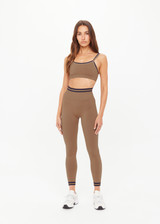THE UPSIDE women’s recycled mocha Form Seamless 25In Legging offers a supportive fit with a soft ribbed waistband and moisture control. Made for yoga and pilates.