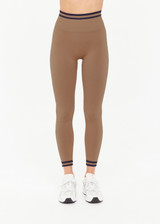 THE UPSIDE women’s recycled mocha Form Seamless 25In Legging offers a supportive fit with a soft ribbed waistband and moisture control. Made for yoga and pilates.