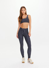 THE UPSIDE women’s recycled supersoft fabric Starlet 28inch Legging is designed for a supportive & comfortable fit and features an elastic drawcord in navy and cream. Made for yoga & pilates.