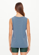 THE UPSIDE women’s denim organic cotton Jeet Tank Top has a relaxed fit with folded arm detail and a green logo at the front. Made for lifestyle.