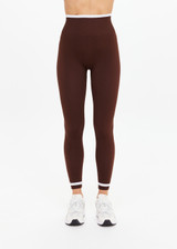 THE UPSIDE women's brown Form Seamless 25in Midi Pant is designed for a firm & supportive fit and features contrast white stripes on waist and ankles. Made for yoga & pilates.