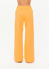 THE UPSIDE women’s lightweight yellow Juliet Pant features a low-rise fit with contrast binds and split hem detail. Perfect for travel and everyday wear.