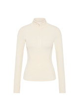 THE UPSIDE women's cream Courtship Dova Run Top is a form fitting long-sleeve and features a quarter zip opening with mock neck, thumb holes and invisible zip pockets. Made for running.