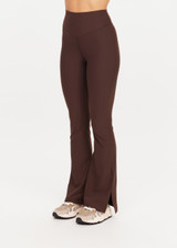 THE UPSIDE women's brown Peached Florence Flare is a high-rise full length flare pant with V waistband and a printed arrow logo on back waistband.