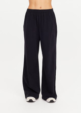 THE UPSIDE women's black recycled cotton Soho Tokio Wide Leg Pant is designed for a relaxed fit and features a soft encased elasticated waistband and wide leg. Made for lifestyle.