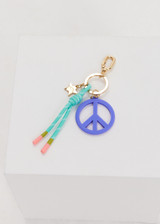 THE UPSIDE blue Peace Keyring features a gold metal star and knotted paracord in minty blue and white, finished with rubber dipped ends.