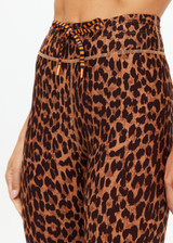 THE UPSIDE women's leopard Malawi 25inch Midi Pant offers soft & supportive fit and features a orange and navy striped drawcord in our recycled peached fabrication. Made for yoga & pilates.