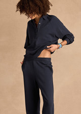 THE UPSIDE women's navy organic cotton Collared Elle Polo is a relaxed long sleeve polo featuring buttons on front. Made for everyday.