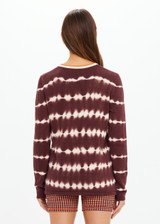 THE UPSIDE women's brown & cream tie dye organic cotton Amana Long Sleeve Knit is designed for a relaxed fit and features a contrast striped neckline in orange. Made for everyday.