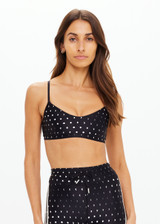 THE UPSIDE women's black Moonstone Zoe Bra offers a soft, supportive fit with a scooped low neckline, T-bar back, and adjustable elastic straps. Made for yoga & pilates.