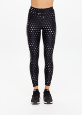 THE UPSIDE women's black Moonstone 25inch Legging has a soft, supportive fit with elastic drawcord, cream aglet ends, and contrast cream side bindings. Made for yoga & pilates.