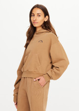 THE UPSIDE women's Kalo Delphi Hoodie is designer for a relaxed fit with drop shoulders and features front patch pocket, and ribbed cuffs and hem. Made for lifestyle.