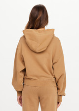 THE UPSIDE women's Kalo Delphi Hoodie is designer for a relaxed fit with drop shoulders and features front patch pocket, and ribbed cuffs and hem. Made for lifestyle.