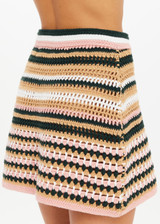 THE UPSIDE women's stripe Bohemia Crochet Mini Skirt is true to size with an encased elastic waist and striped pattern in pink, green, tan, and cream. Made for lifestyle.