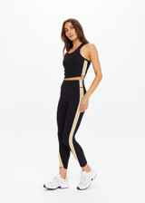THE UPSIDE women's black Arcadia Sophie Crop Top is supportive and comfortable with a racerback longline design, internal shelf bra, and removable cups. Made for yoga & pilates.