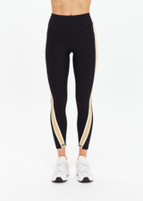 THE UPSIDE women's black Arcadia 25inch Legging is supportive and comfortable with recycled rib fabric, contrast tan panel, and cream bind details. Made for yoga & pilates.